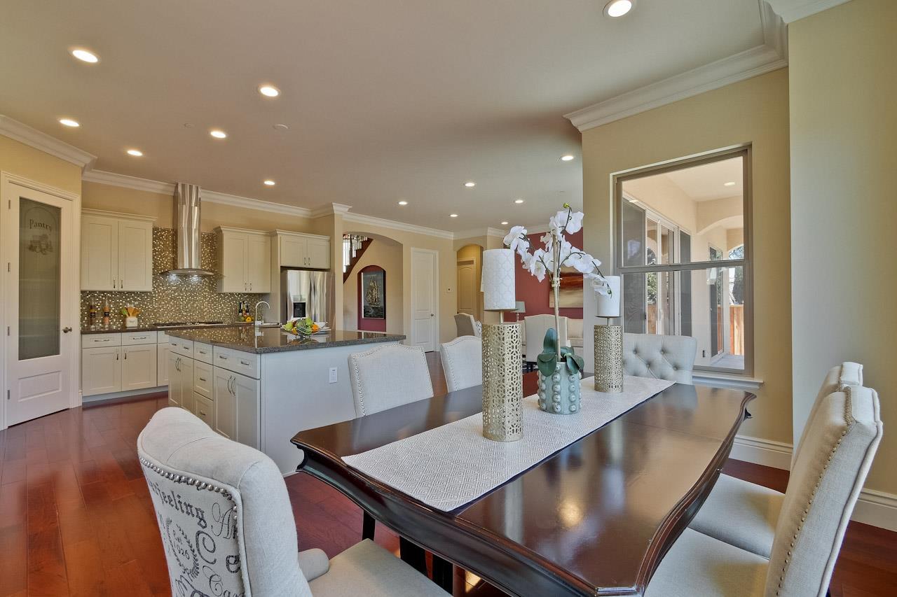 932 Marion Way Sunnyvale, CA 94087 - Photo 17 of 47 a dining room with furniture and wooden floor