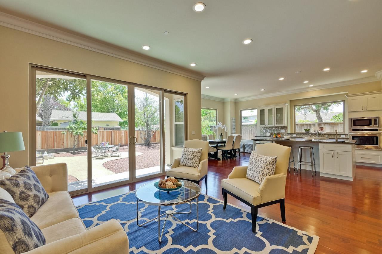 932 Marion Way Sunnyvale, CA 94087 - Photo 18 of 47 a living room with furniture and a large window