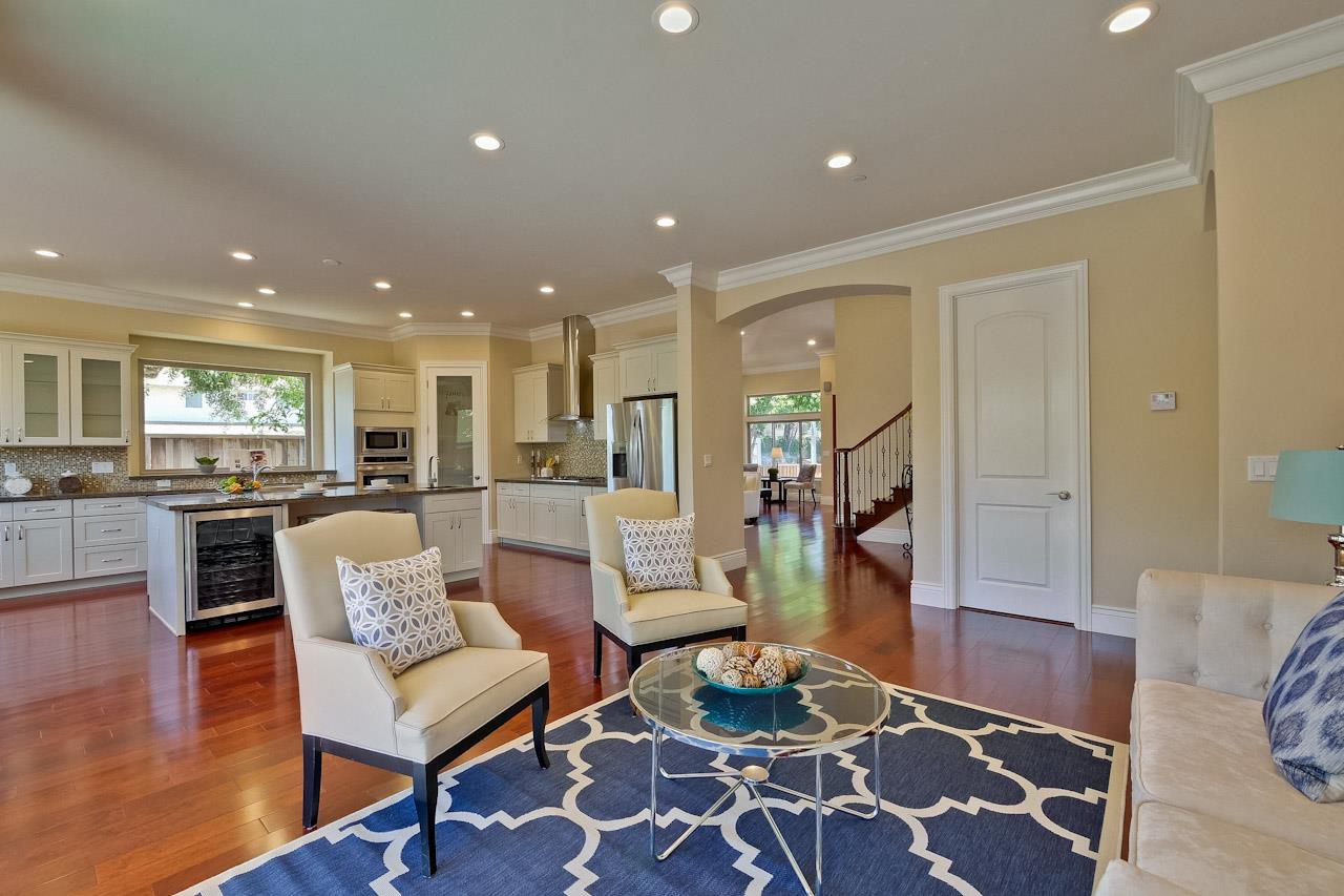 932 Marion Way Sunnyvale, CA 94087 - Photo 19 of 47 a living room with furniture and a wooden floor