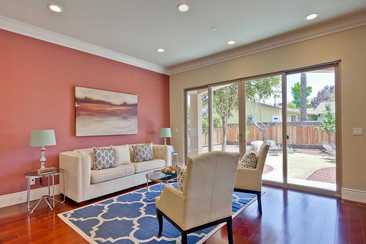 932 Marion Way Sunnyvale, CA 94087 - Photo 20 of 47 a living room with furniture and a large window