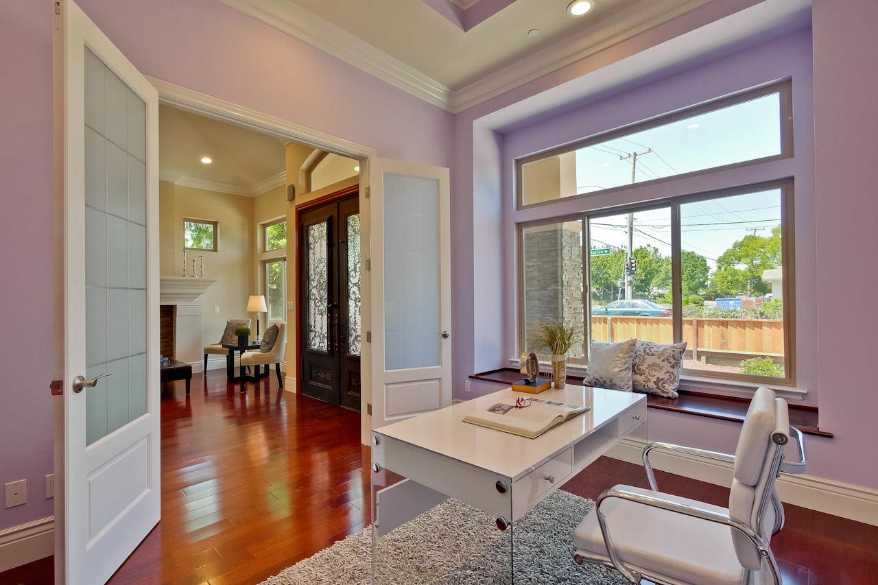 932 Marion Way Sunnyvale, CA 94087 - Photo 22 of 47 a living room with furniture a table and a large window