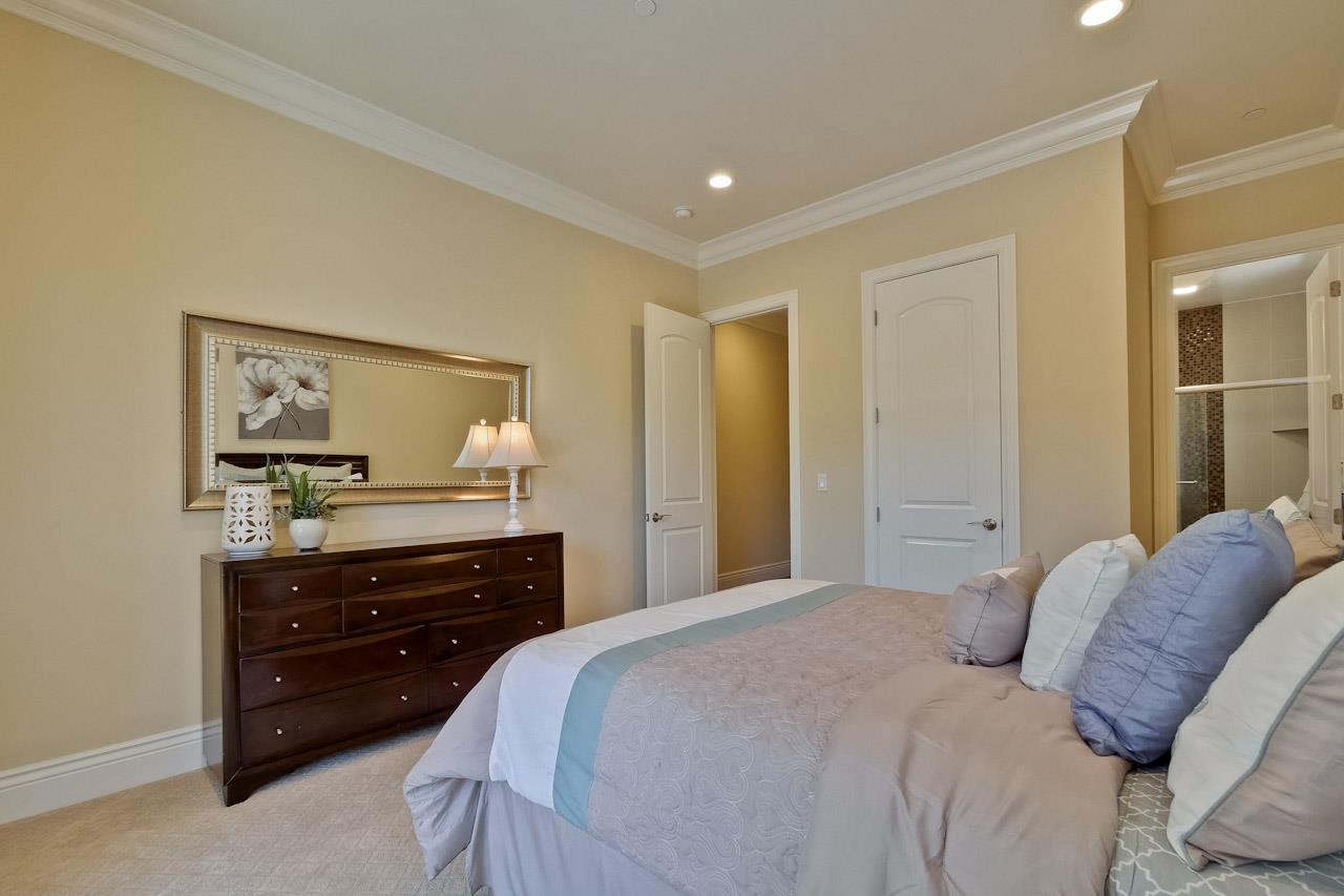 932 Marion Way Sunnyvale, CA 94087 - Photo 25 of 47 a bedroom with a bed and a dresser
