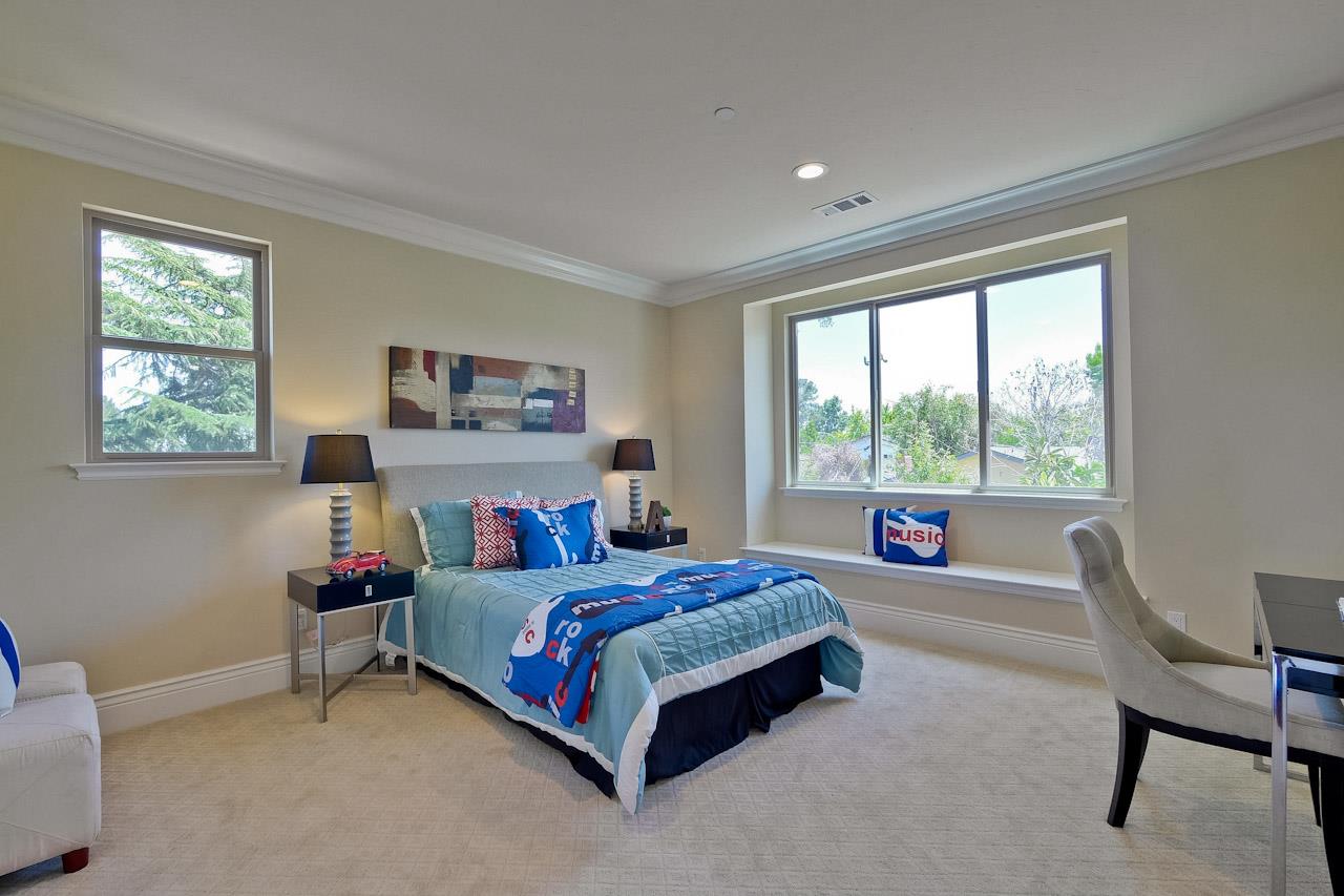 932 Marion Way Sunnyvale, CA 94087 - Photo 28 of 47 a bedroom with a bed and a large window
