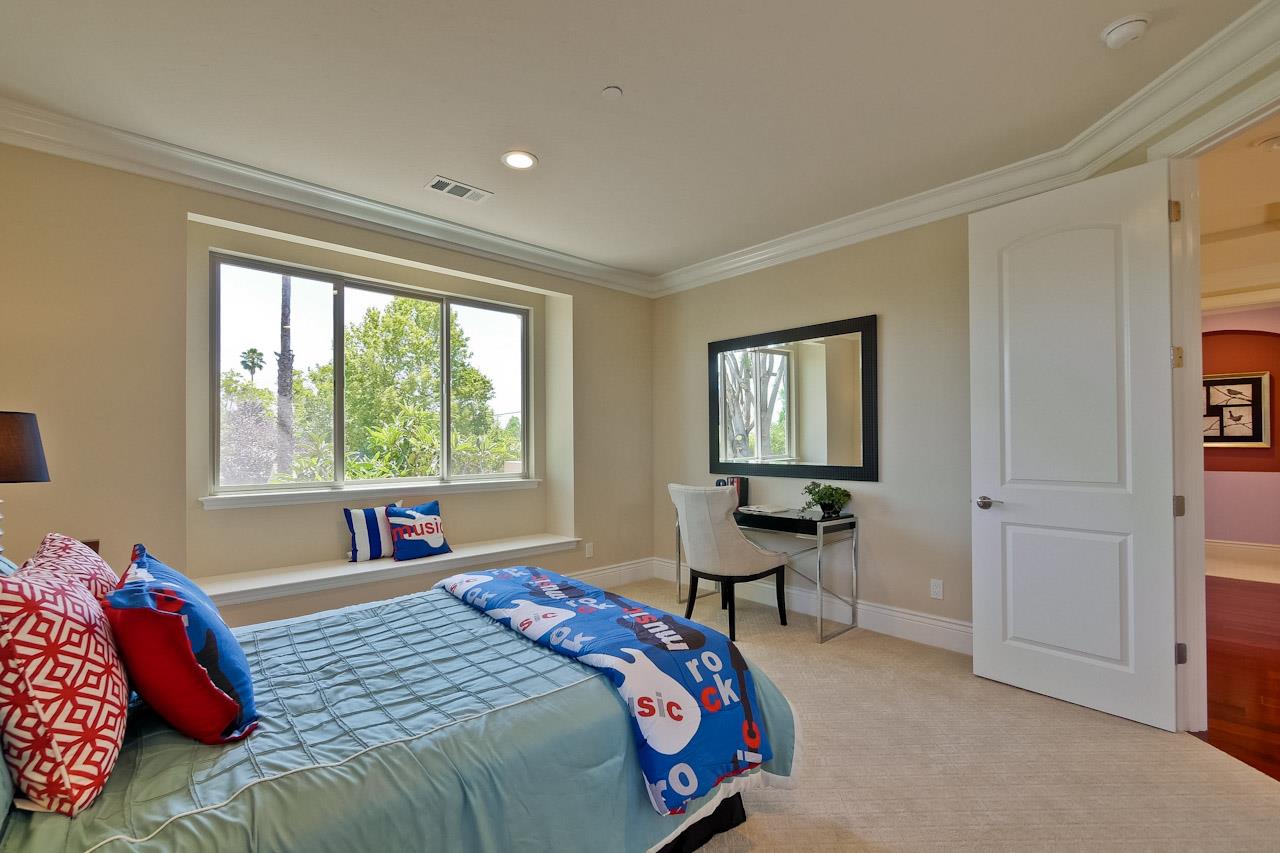 932 Marion Way Sunnyvale, CA 94087 - Photo 29 of 47 a bedroom with a bed and a window