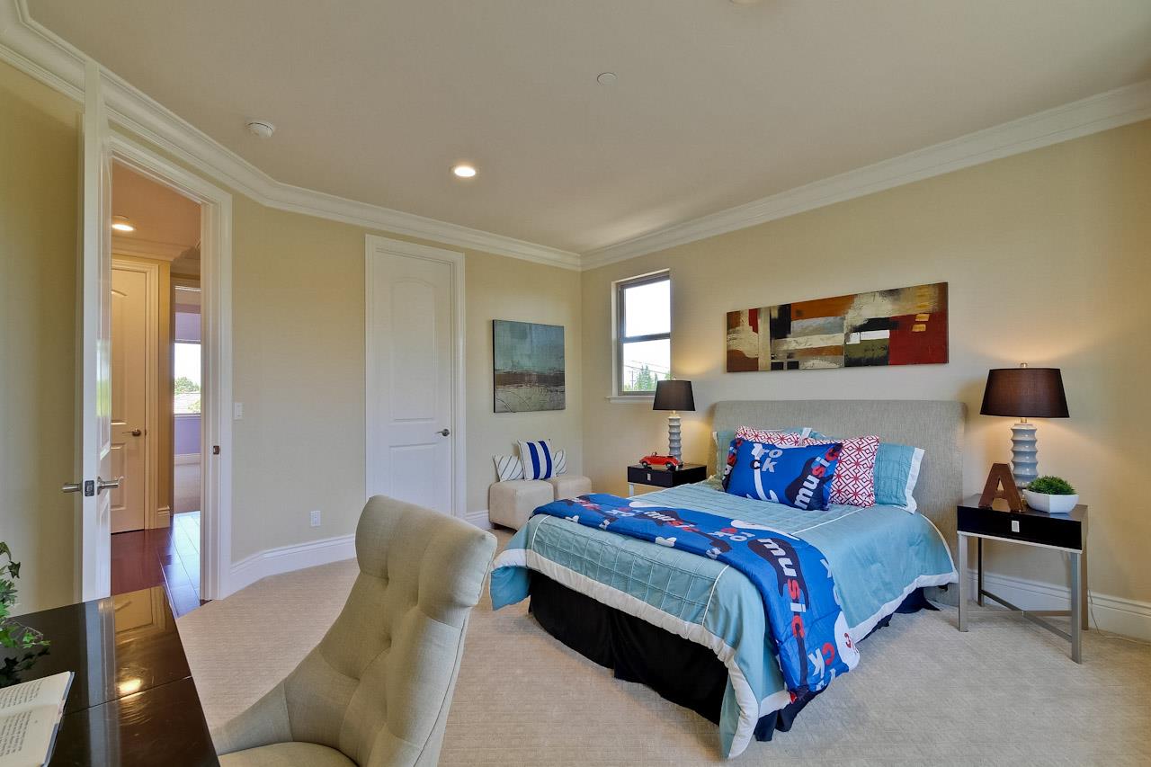 932 Marion Way Sunnyvale, CA 94087 - Photo 30 of 47 a bedroom with a bed and wooden floor