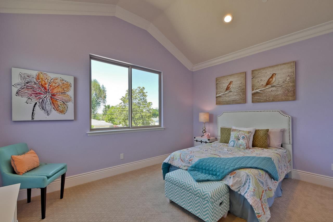 932 Marion Way Sunnyvale, CA 94087 - Photo 32 of 47 a bedroom with a bed and wooden floor