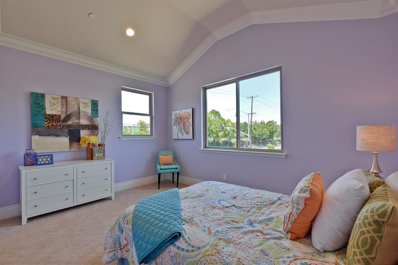 932 Marion Way Sunnyvale, CA 94087 - Photo 33 of 47 a bedroom with a bed and a dresser