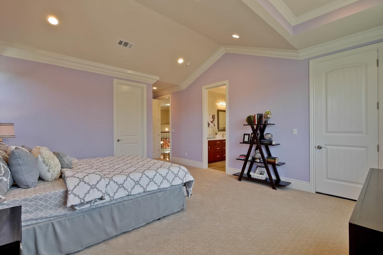 932 Marion Way Sunnyvale, CA 94087 - Photo 37 of 47 a bedroom with a bed and a view of living room