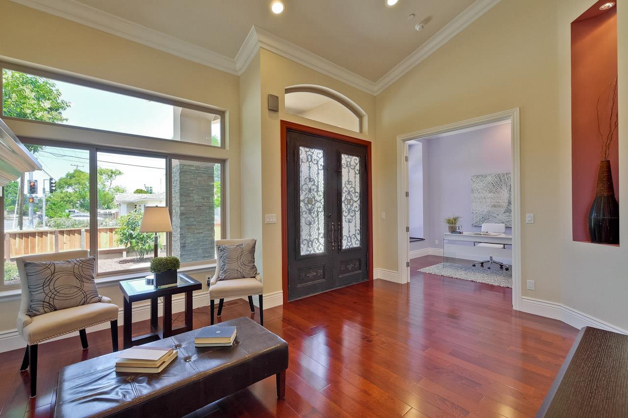 932 Marion Way Sunnyvale, CA 94087 - Photo 4 of 47 a living room with furniture and a large window