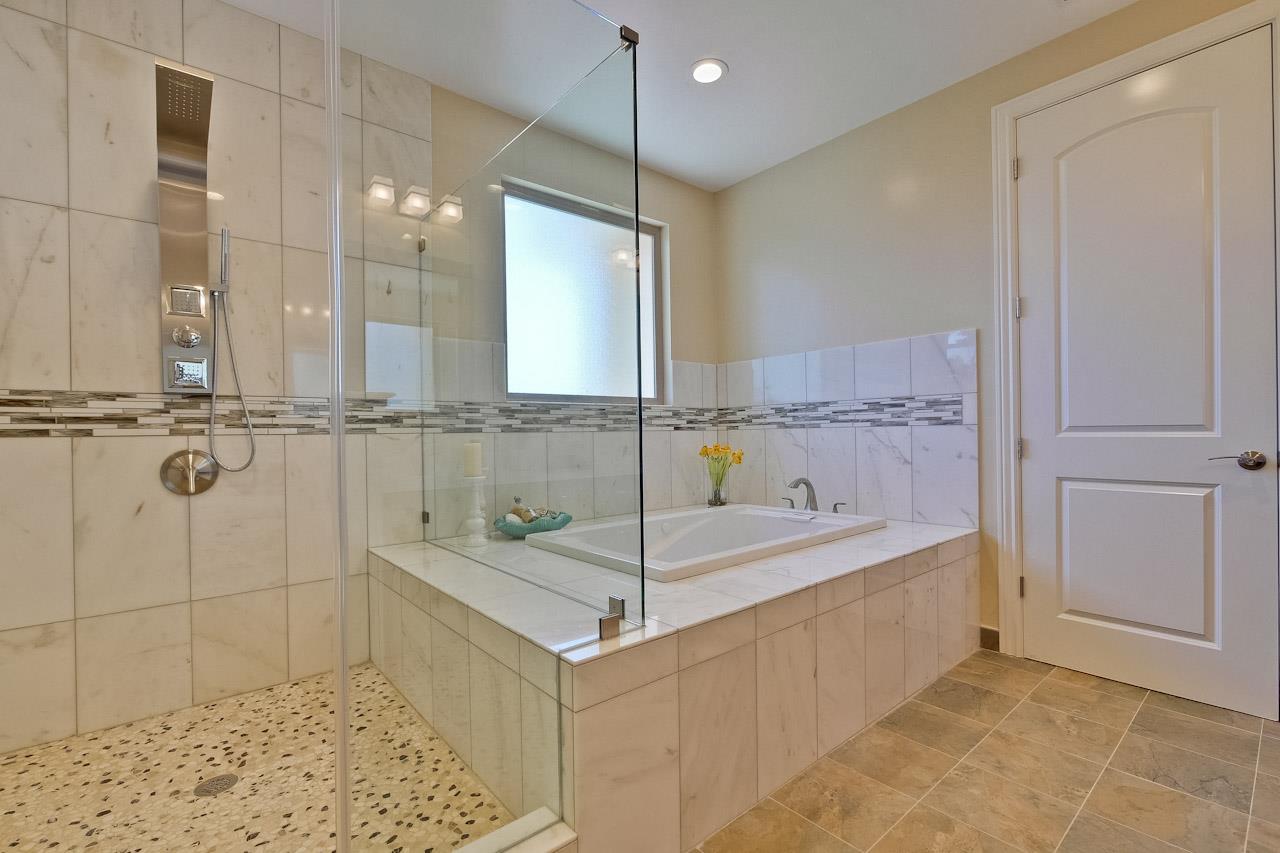 932 Marion Way Sunnyvale, CA 94087 - Photo 43 of 47 a bathroom with a bathtub and a shower