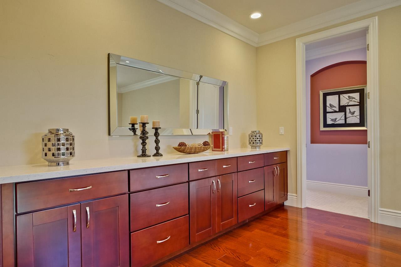 932 Marion Way Sunnyvale, CA 94087 - Photo 44 of 47 a spacious bathroom with a double vanity sink and a mirror