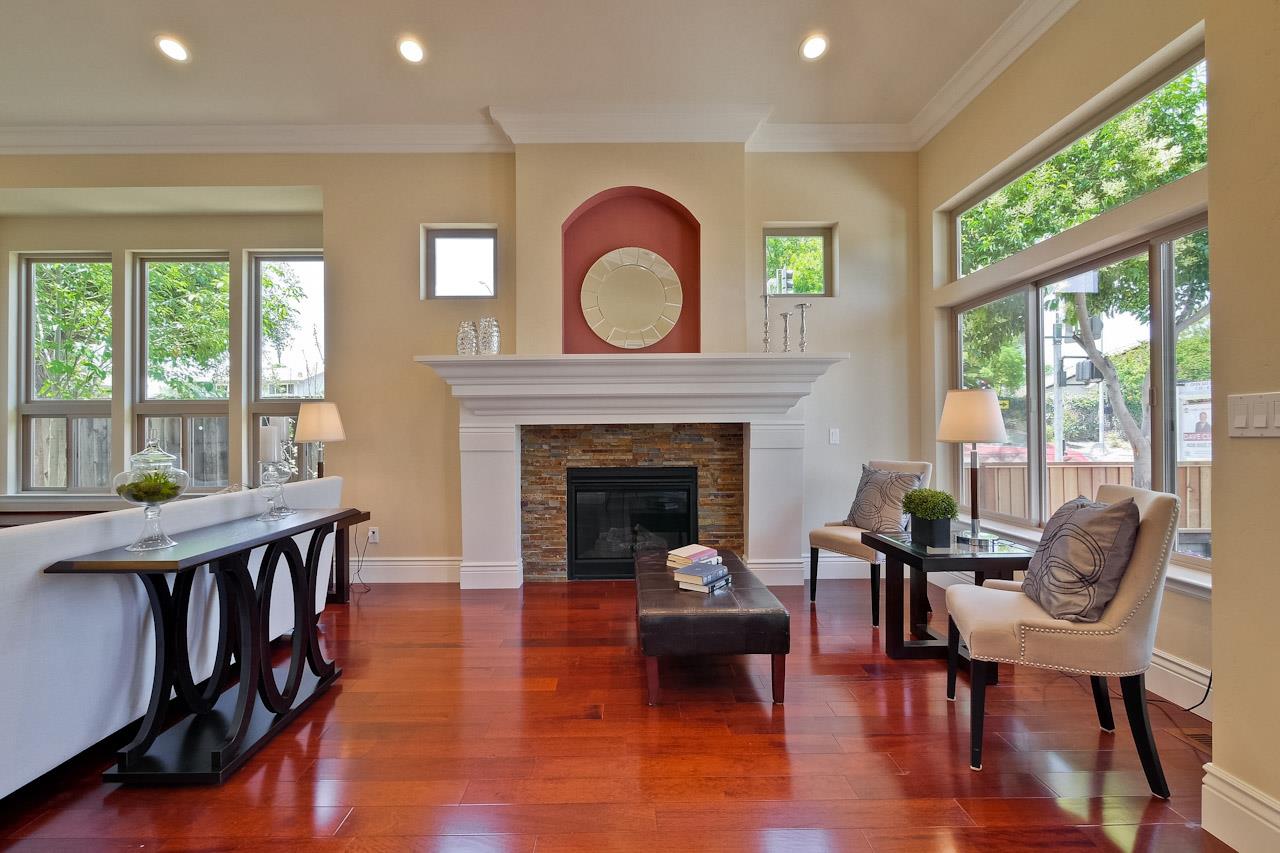 932 Marion Way Sunnyvale, CA 94087 - Photo 6 of 47 a living room with furniture and a fireplace