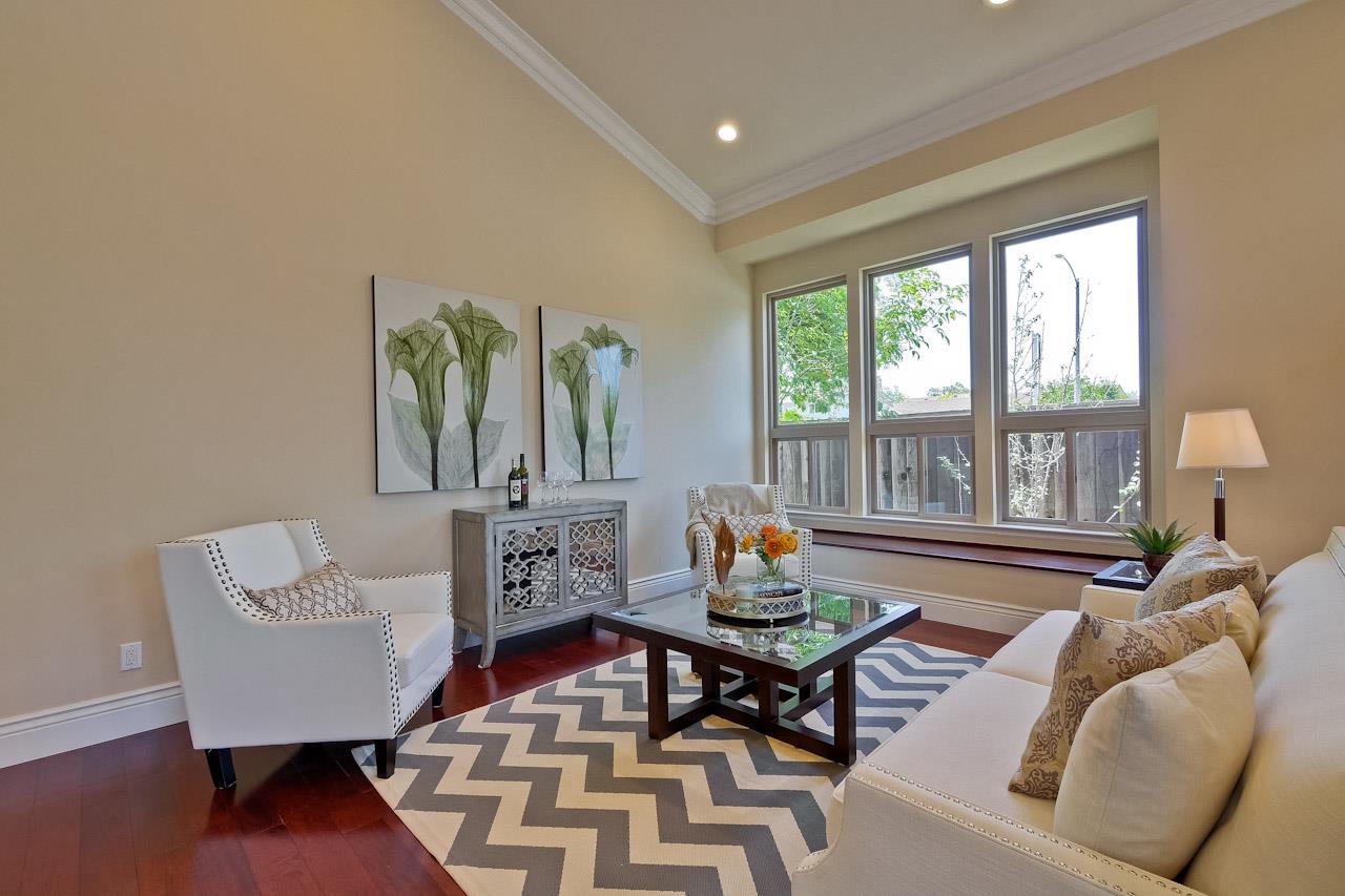932 Marion Way Sunnyvale, CA 94087 - Photo 7 of 47 a living room with furniture and a large window