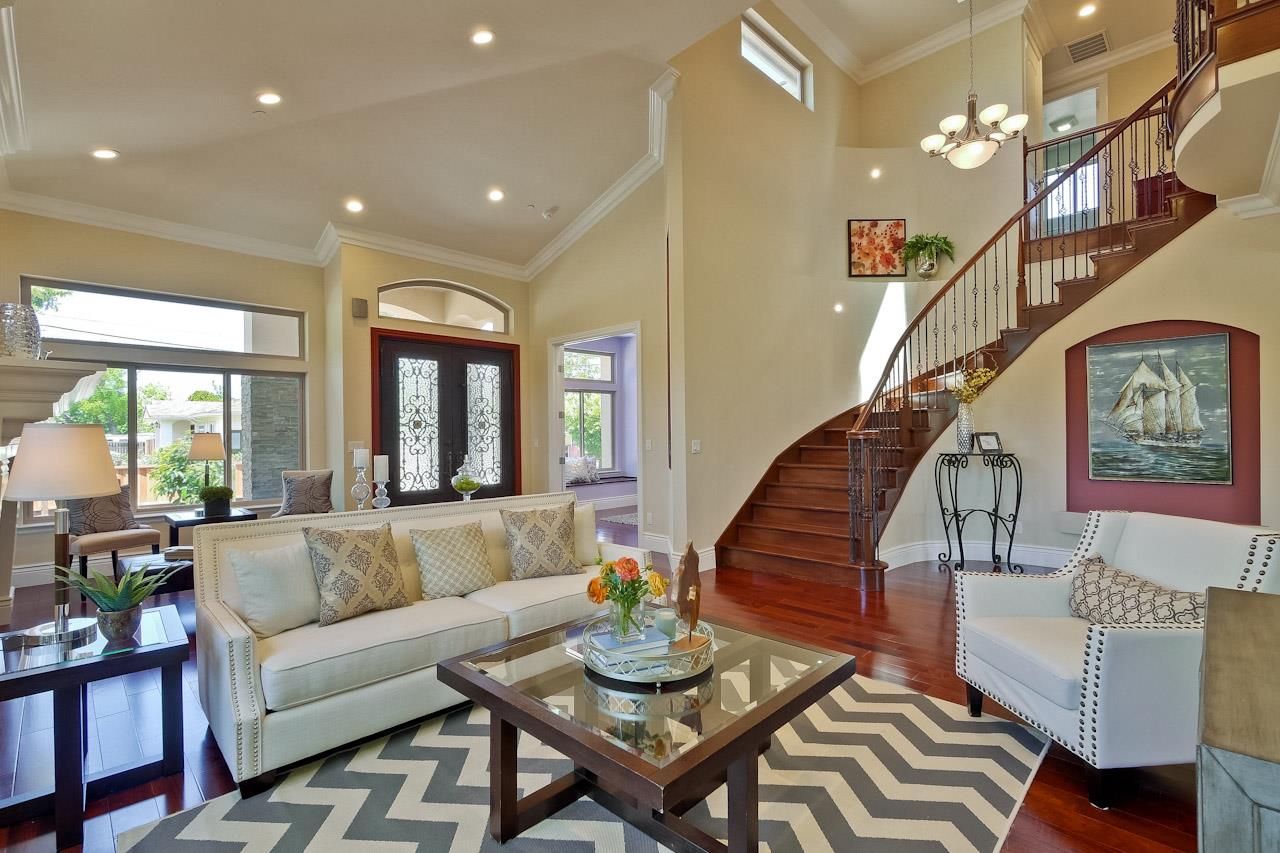 932 Marion Way Sunnyvale, CA 94087 - Photo 8 of 47 a living room with furniture and wooden floor