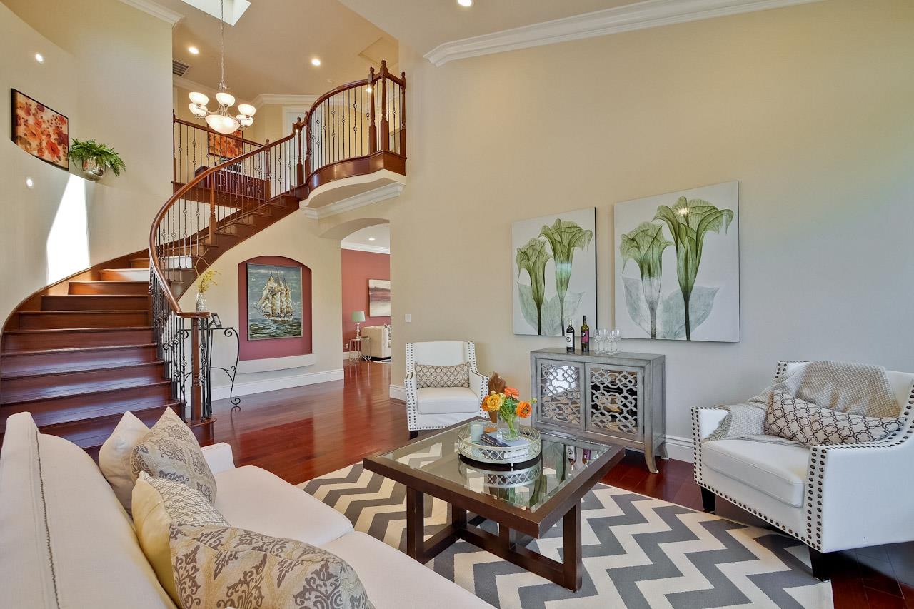 932 Marion Way Sunnyvale, CA 94087 - Photo 9 of 47 a living room with furniture and a chandelier