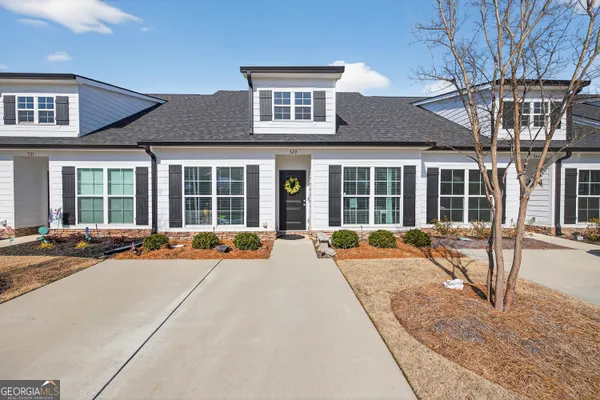 front view of a building with a large window