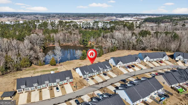 a view of a lake with a city
