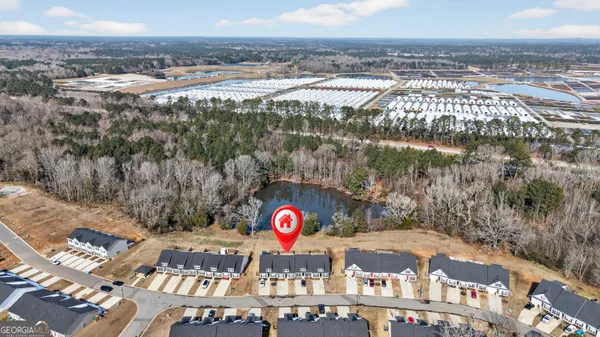 a view of a lake in middle of the town
