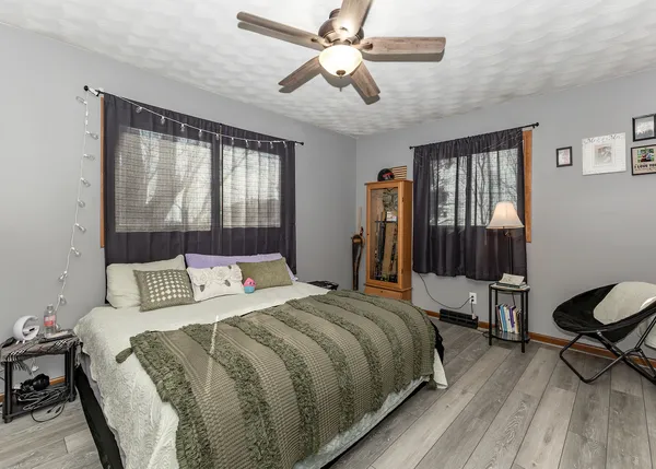 a bedroom with a bed and a closet