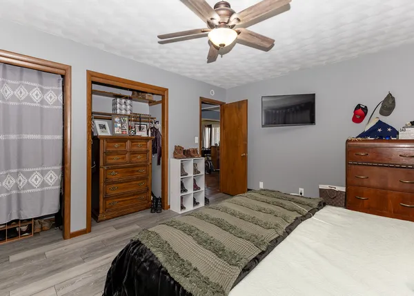 a bathroom with a granite countertop sink a vanity and a mirror