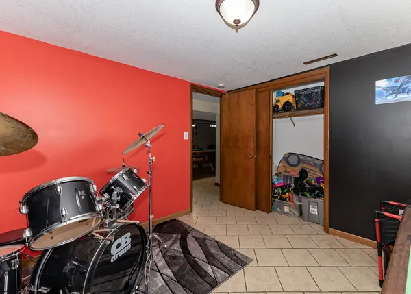 a room with furniture and soccer table