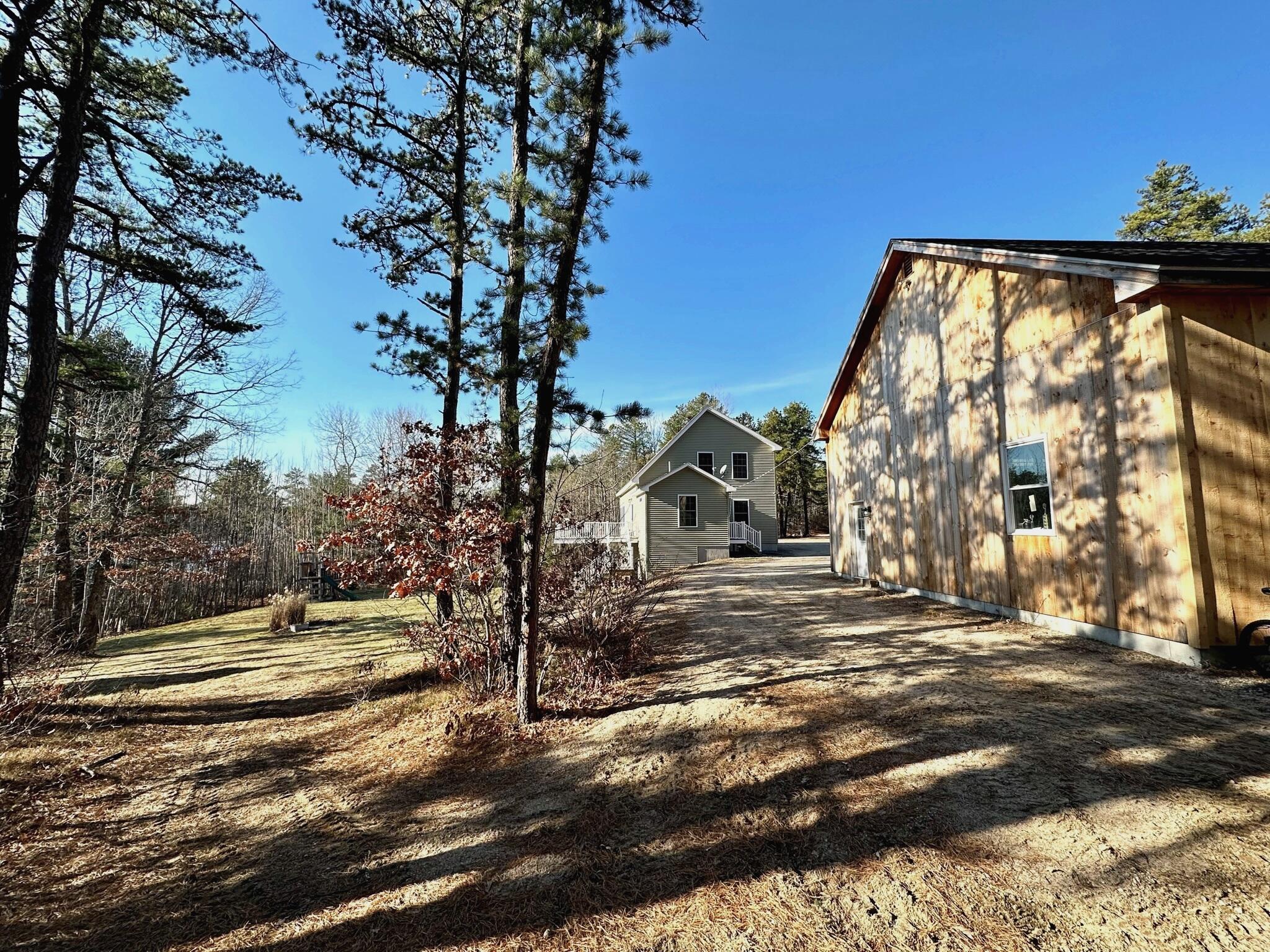 126 Poverty Pond Road West Newfield, ME 04095 - Photo 6 of 67 Rear view of garage looking at home.