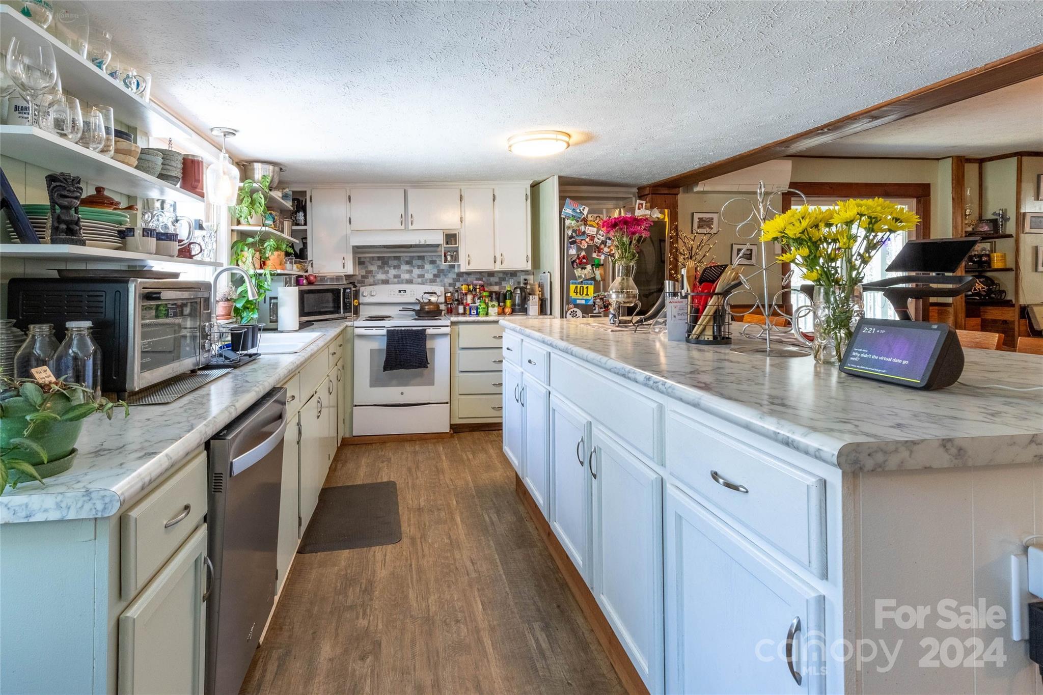 240 Henry Road Sylva, NC 28779 - Photo 20 of 41 a kitchen with sink and cabinets