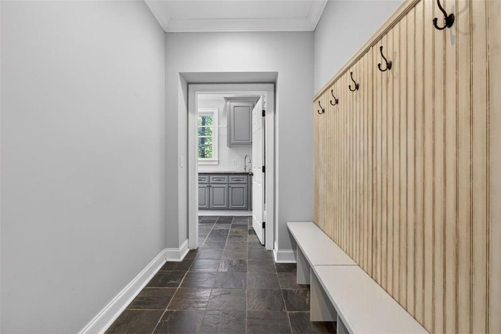2700 Bay Ridge Drive Loganville, GA 30052 - Photo 20 of 62 a view of a hallway with wooden floor and entryway