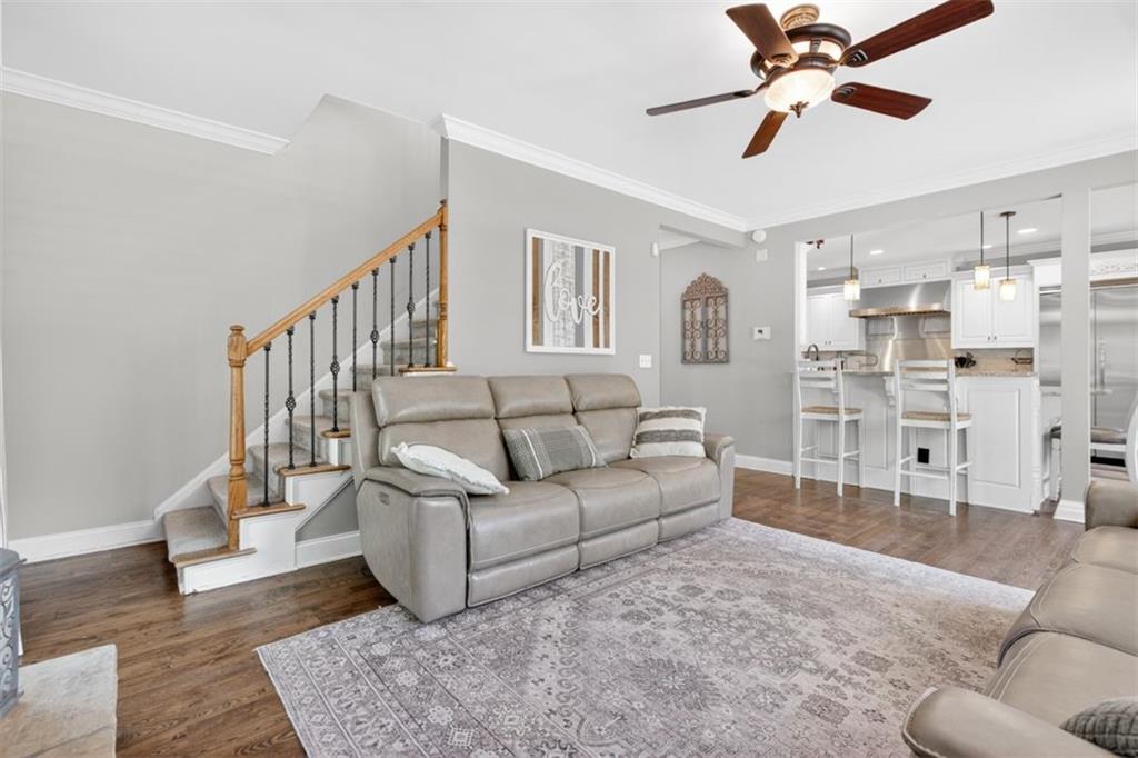 2700 Bay Ridge Drive Loganville, GA 30052 - Photo 26 of 62 a living room with furniture and a wooden floor
