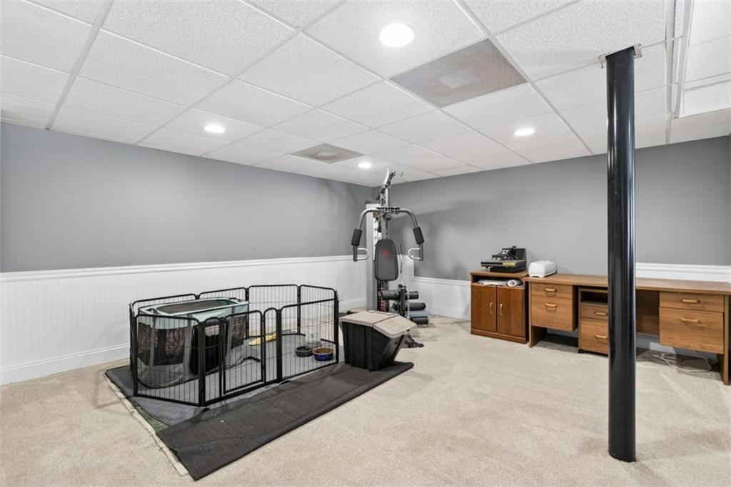 2700 Bay Ridge Drive Loganville, GA 30052 - Photo 47 of 62 a view of a room with gym equipment