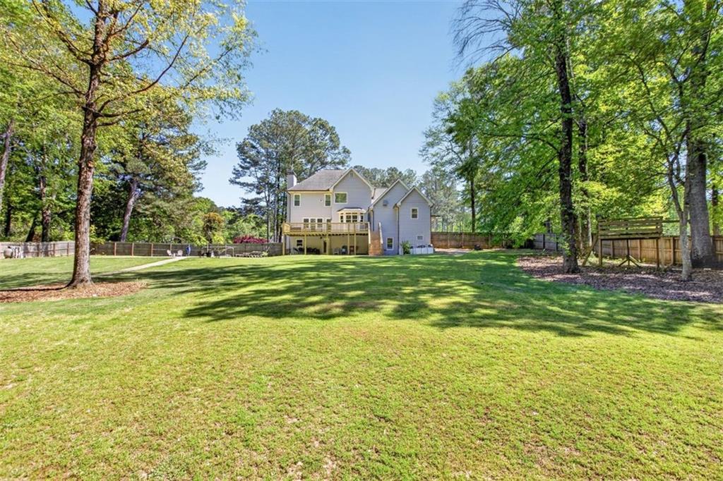 2700 Bay Ridge Drive Loganville, GA 30052 - Photo 62 of 62 a view of a house with a big yard