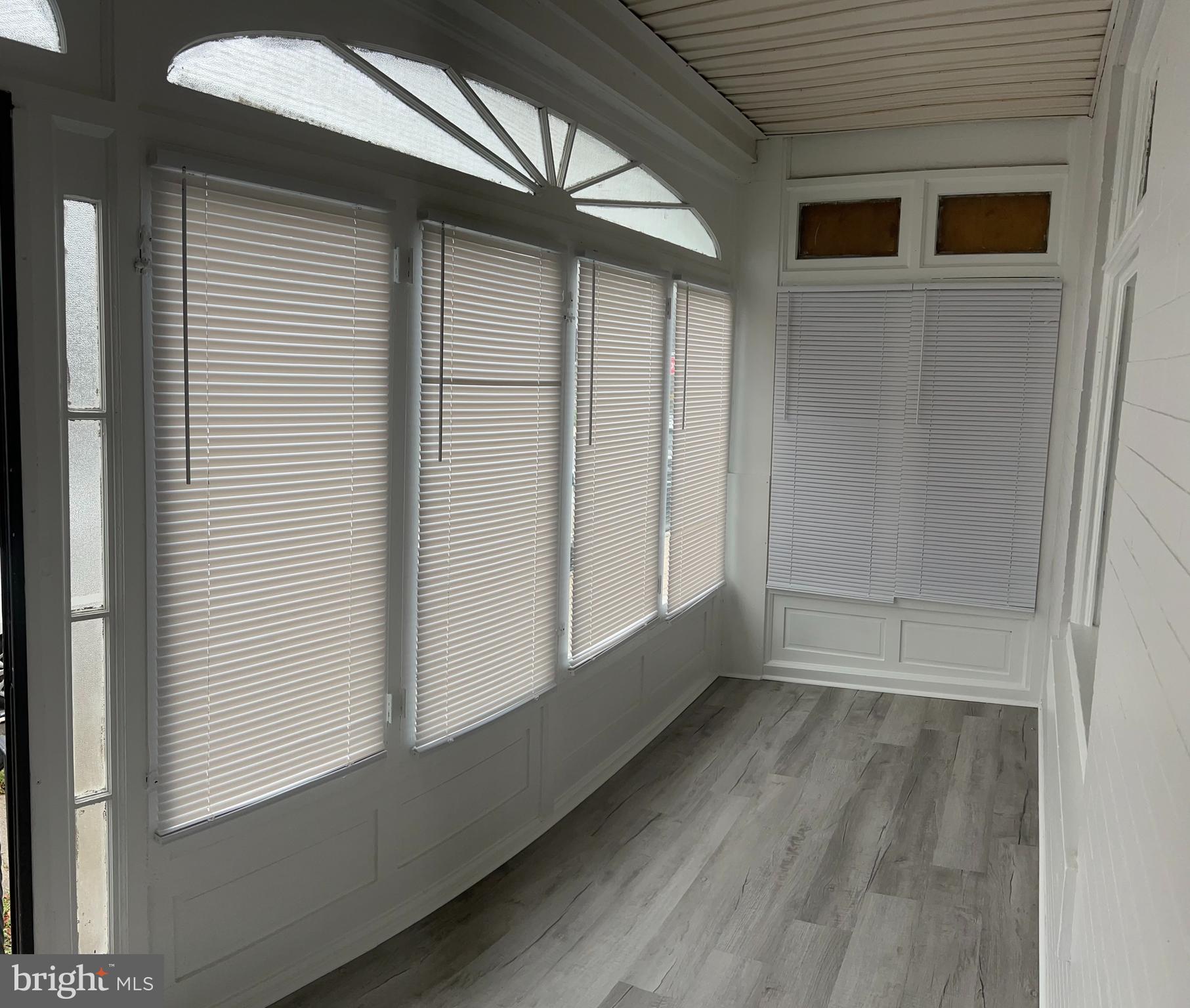 5519 Race Street Philadelphia, PA 19139 - Photo 2 of 25 a view of empty room with wooden floor and fan