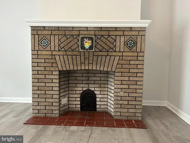 a brick building with black white walls