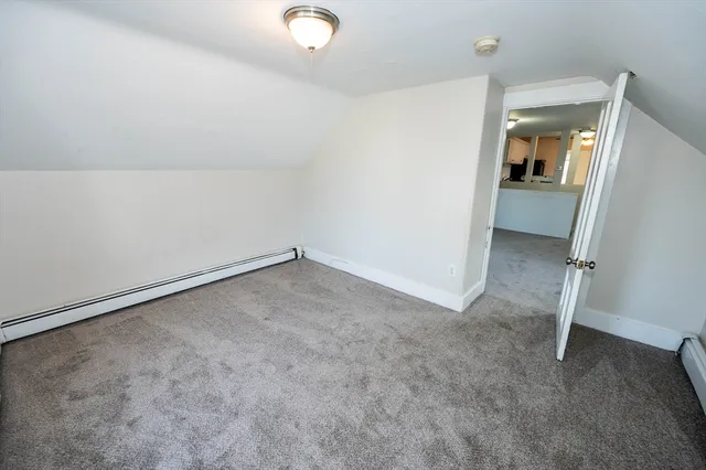 an empty room with staircase