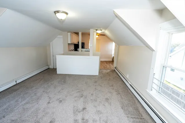 a view of a kitchen with a sink and dishwasher