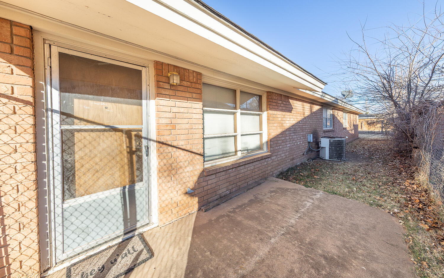 2408 33rd Street Lubbock, TX 79411 - Photo 29 of 31 a view of a house with a yard
