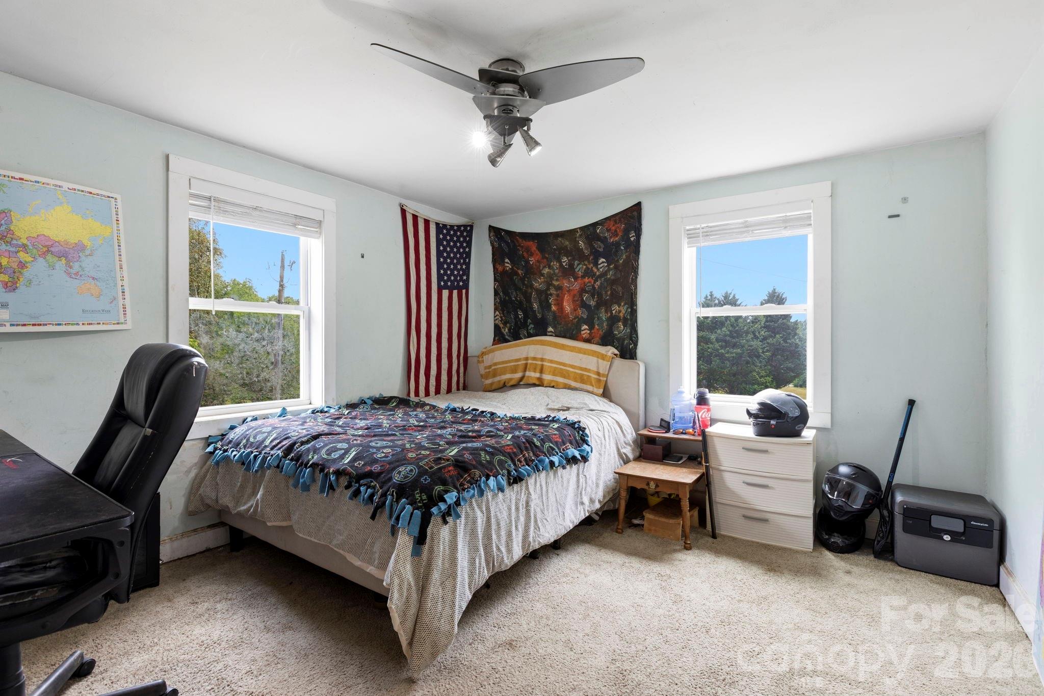 4 Mountain View Road Asheville, NC 28806 - Photo 11 of 35 a bedroom with a bed chairs and window