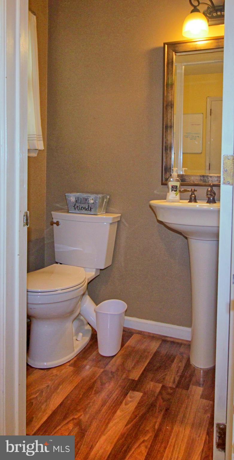 5108 New Kent Road Wilmington, DE 19808 - Photo 14 of 26 a bathroom with a toilet and a sink