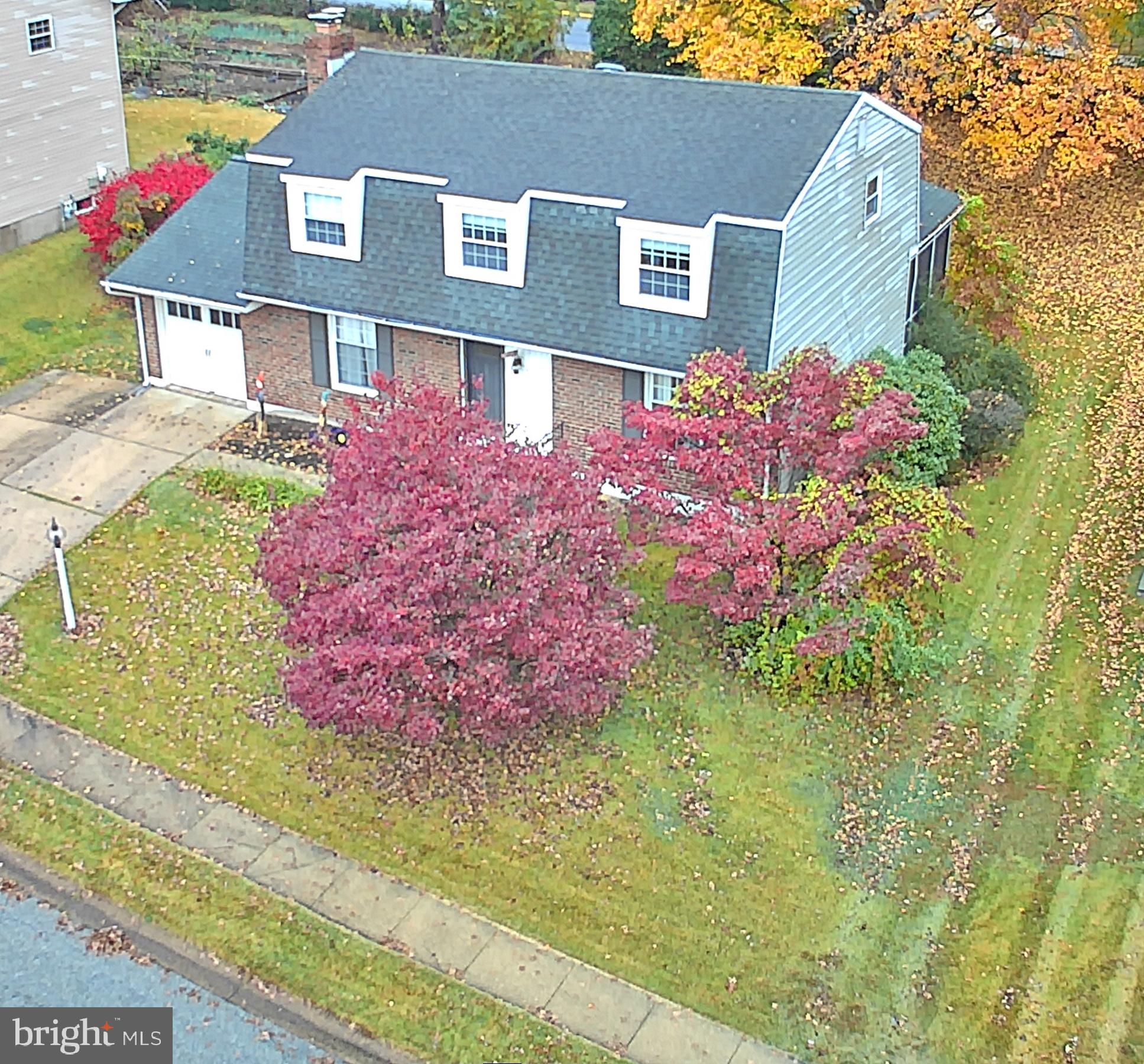 5108 New Kent Road Wilmington, DE 19808 - Photo 3 of 26 a front view of a multi story residential apartment building with yard