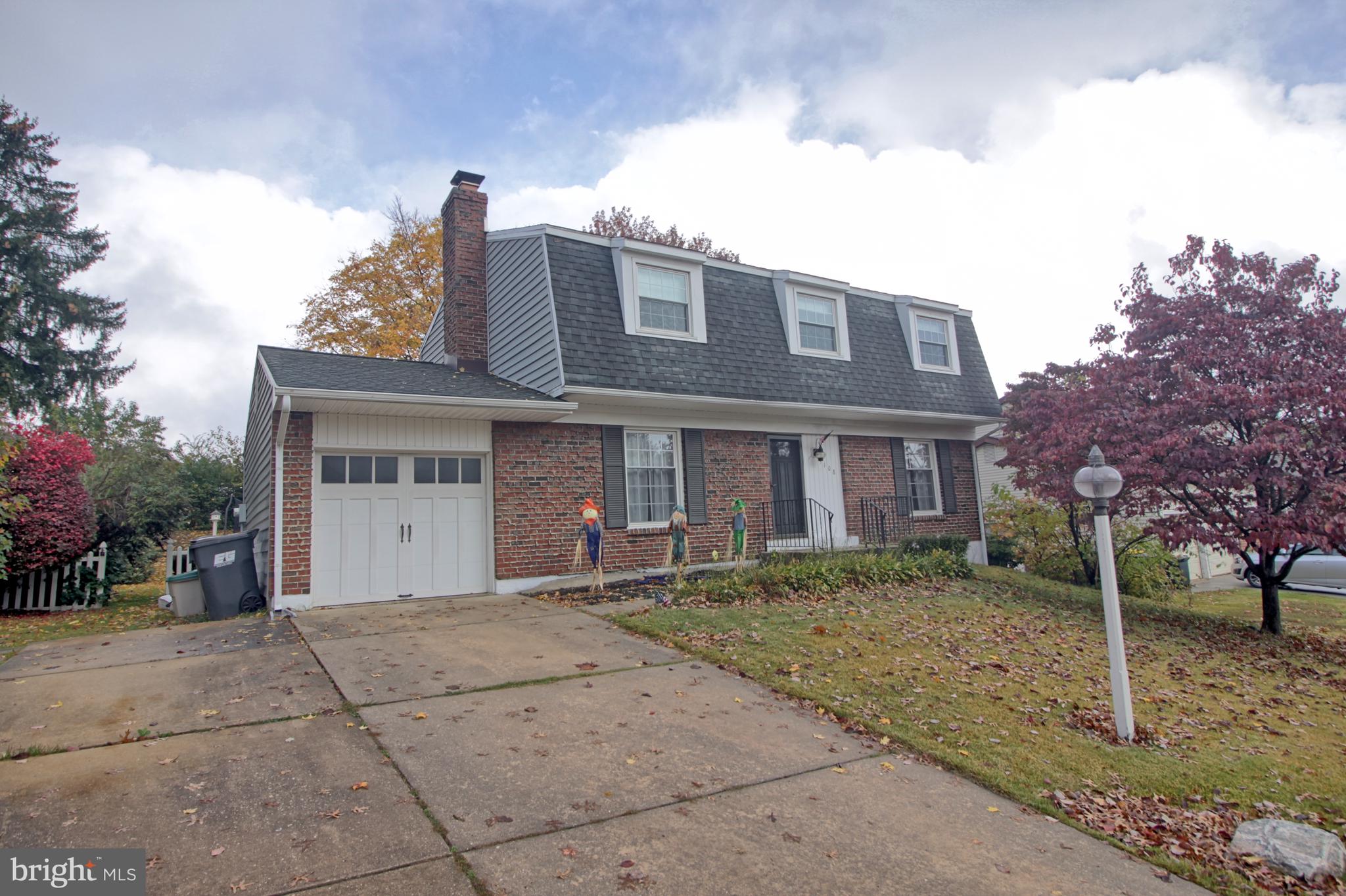5108 New Kent Road Wilmington, DE 19808 - Photo 7 of 26 a front view of a house with garden