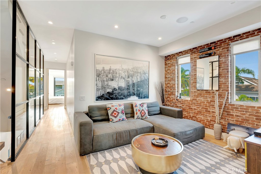 620 Huntington Street Huntington Beach, CA 92648 - Photo 22 of 65 a living room with furniture and a large window