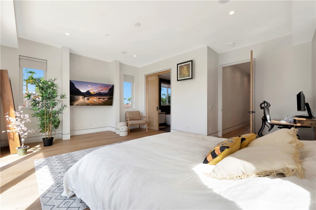 620 Huntington Street Huntington Beach, CA 92648 - Photo 26 of 65 a bedroom with a bed and a flat screen tv