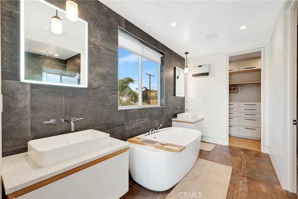 620 Huntington Street Huntington Beach, CA 92648 - Photo 28 of 65 a bathroom with a toilet sink and mirror