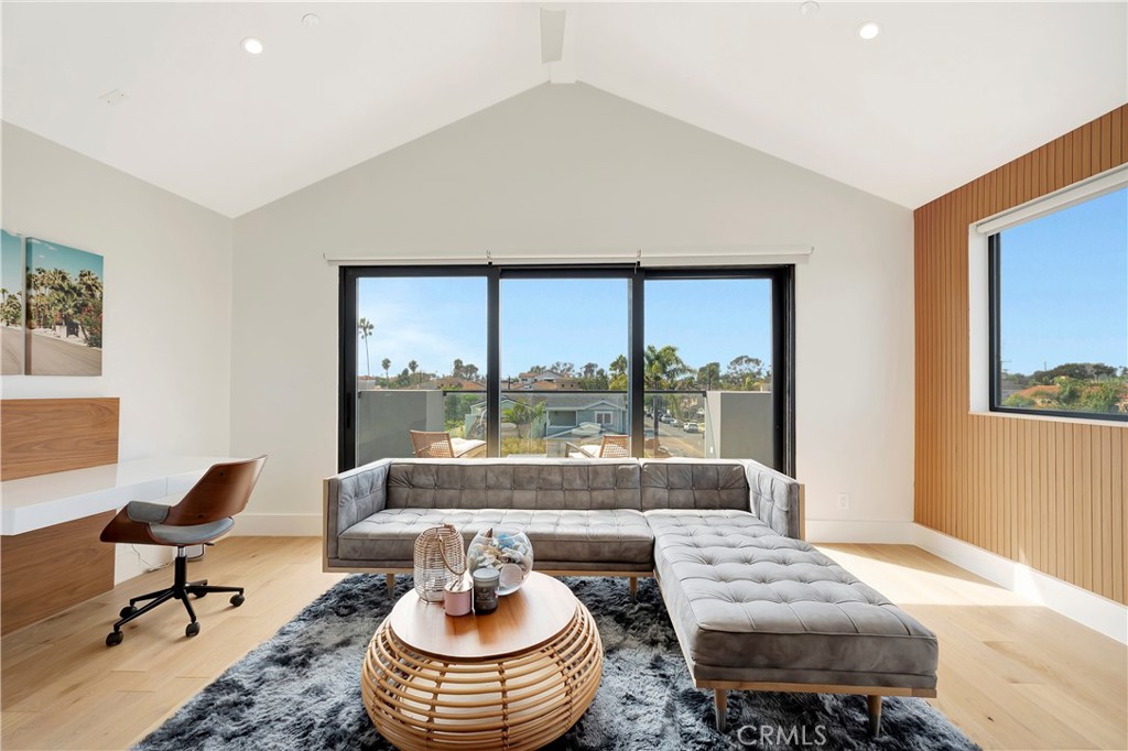 620 Huntington Street Huntington Beach, CA 92648 - Photo 37 of 65 a living room with furniture and a large window