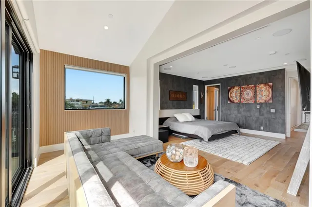 a room with furniture and a flat screen tv