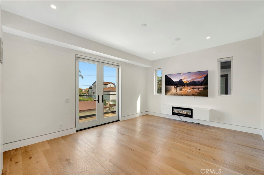 620 Huntington Street Huntington Beach, CA 92648 - Photo 43 of 65 a view of a livingroom with wooden floor