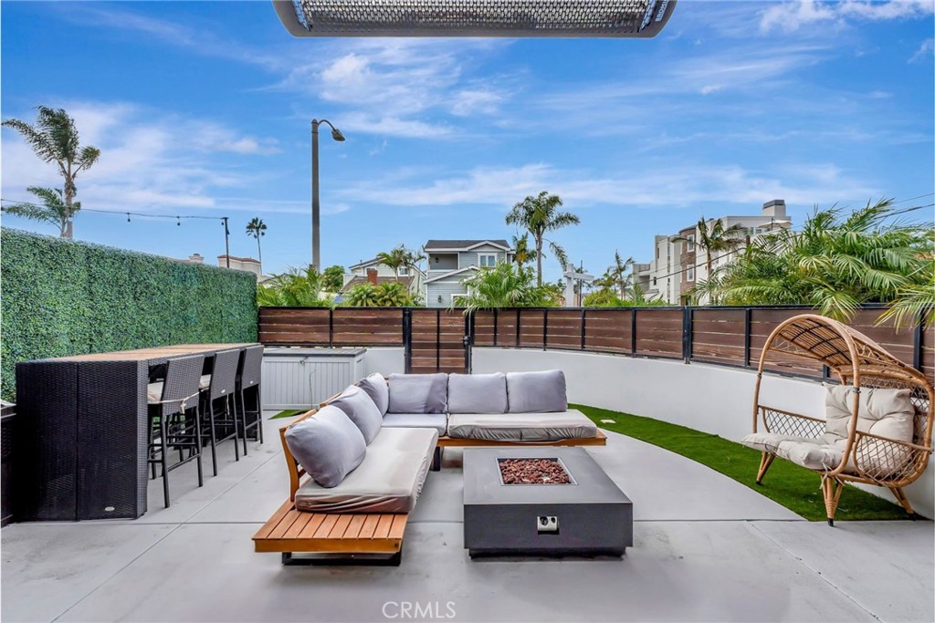 620 Huntington Street Huntington Beach, CA 92648 - Photo 8 of 65 a view of a patio with couches chairs and a potted plants