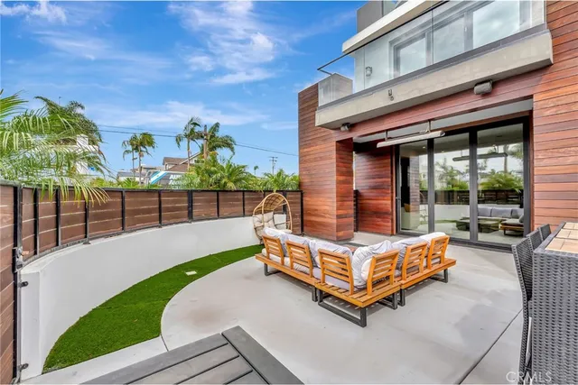 a view of a dining room with furniture and window