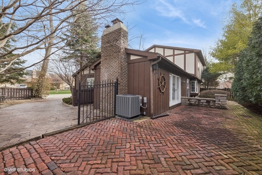 314 Fuller Road Hinsdale, IL 60521 - Photo 18 of 21 a view of a house with a yard