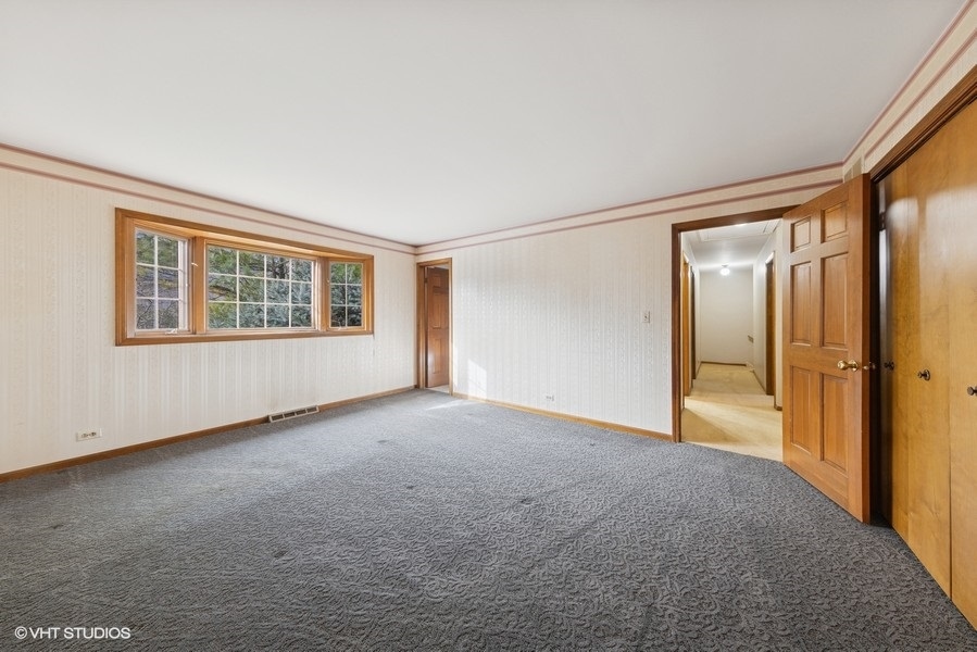 314 Fuller Road Hinsdale, IL 60521 - Photo 10 of 21 a view of an empty room with a window